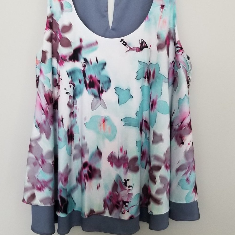 Sleeveless flowy dressy top